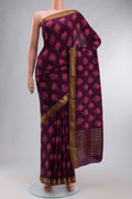 Purple Mysore Crepe Saree with Printed design on the body and Zari Border displayed on a mannequin