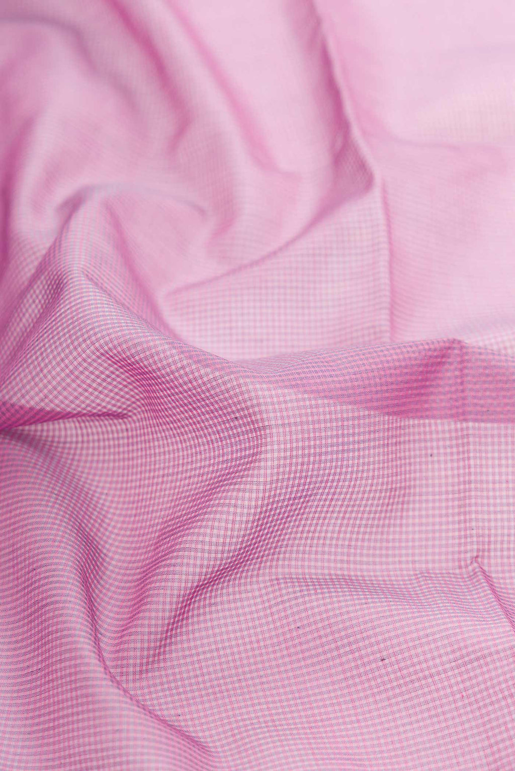 Close up of Lavender Dual Tone Silk Cotton Saree with Checked design on the body and Zari Border displaying folds