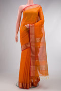 Mustard Maheshwari Silk Cotton Saree with Stripes on the body and Zari Border.  displayed on a mannequin