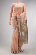 Rose Gold Maheshwari Silk Cotton Saree with Stripes on the body and Zari Border.  displayed on a mannequin