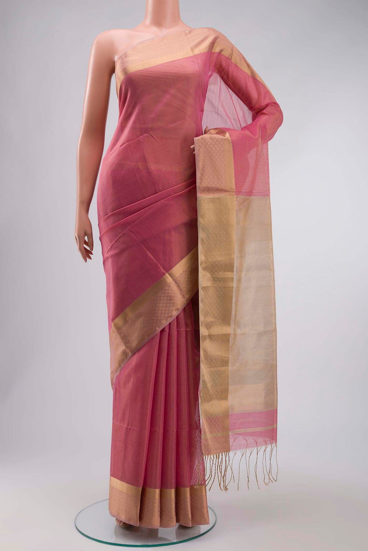 Pink Maheshwari Silk Saree with Plain Body and Zari Border displayed on a mannequin