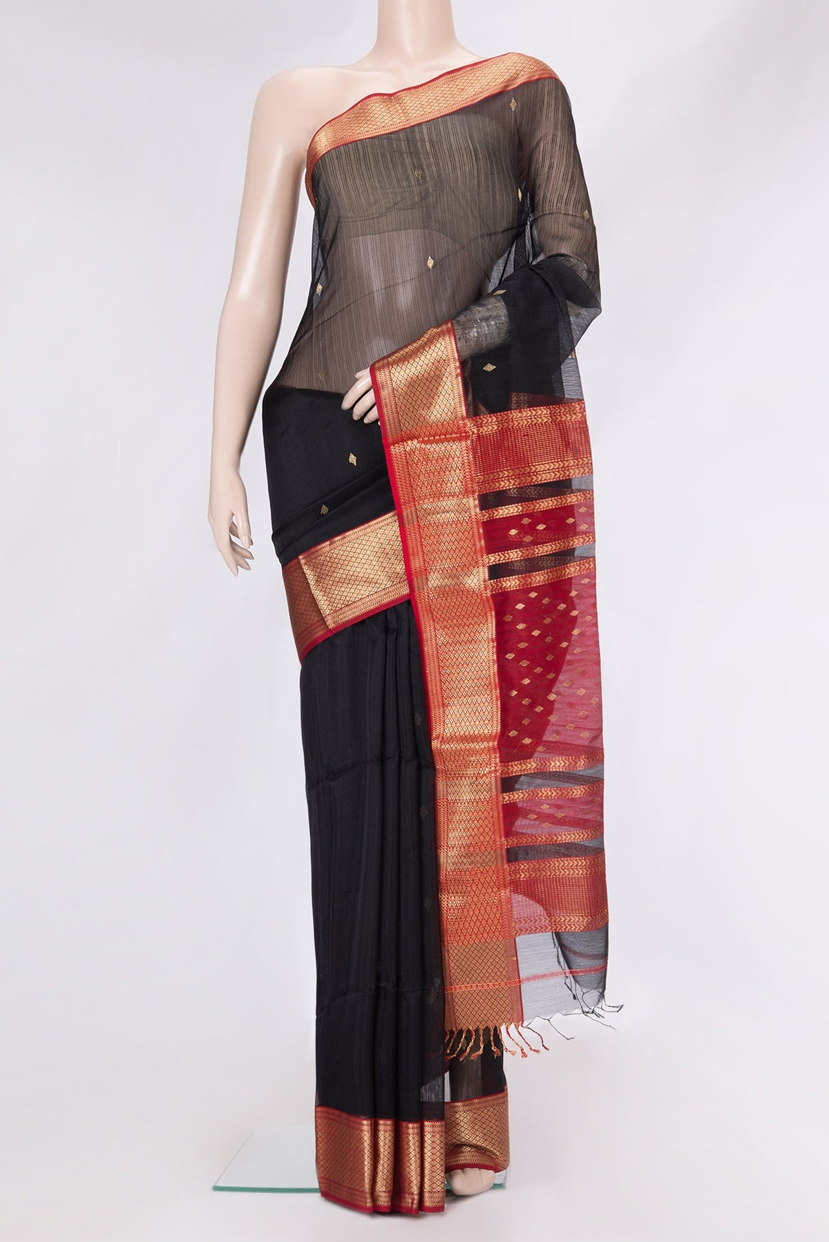 Black Dual Tone Maheshwari Silk Saree with Zari Butta on the body and Zari Border.  displayed on a mannequin