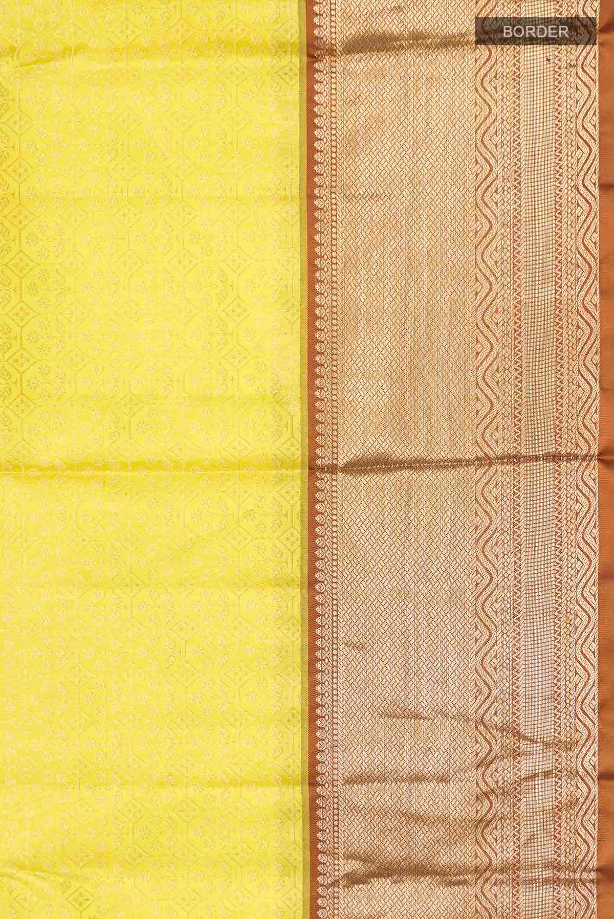 Border image of Yellow Kanchipuram Silk Saree with Zari Brocade on the body and Zari Border