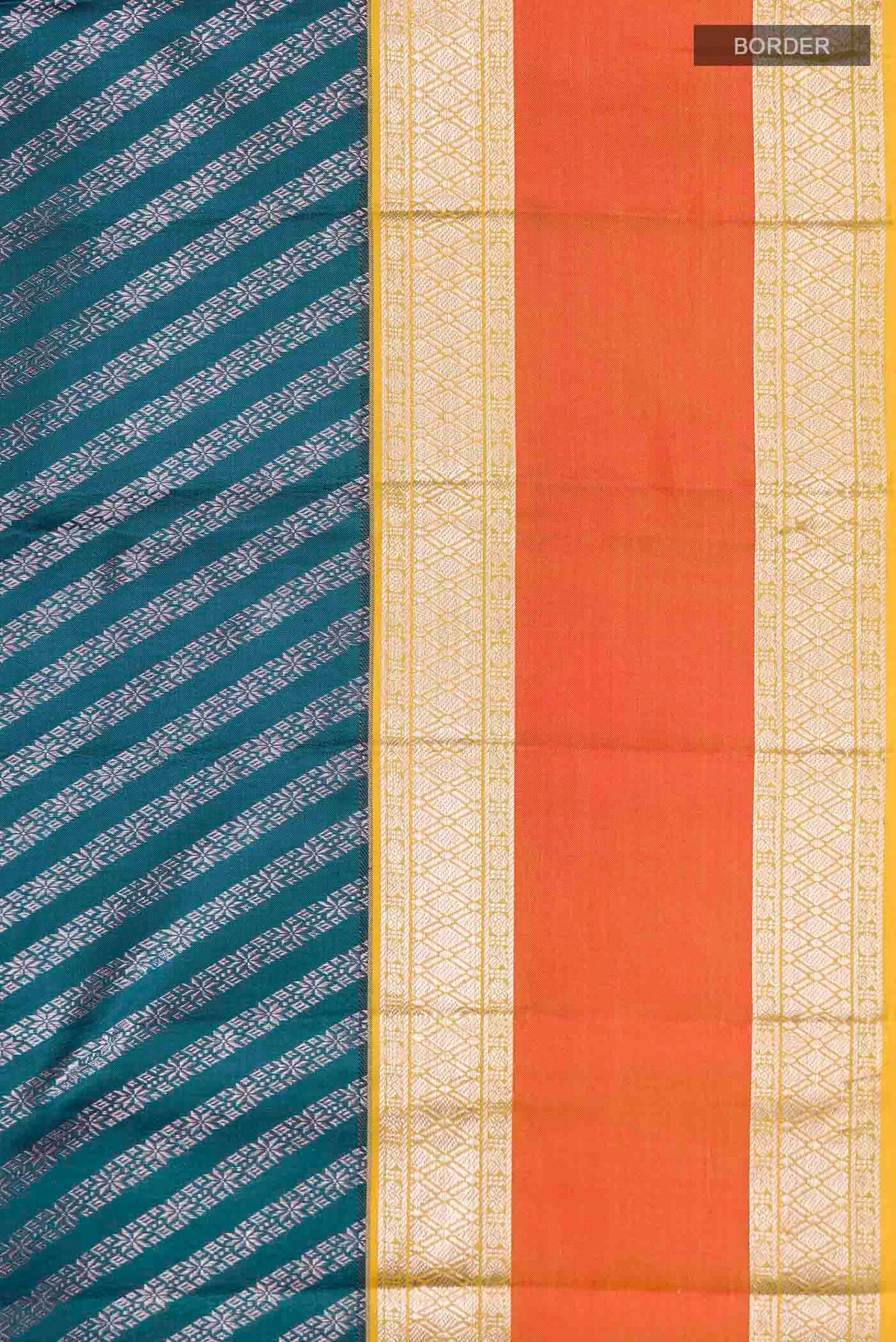 Border image of Blue Kanchipuram Silk Saree with Zari Brocade on the body and Zari Border