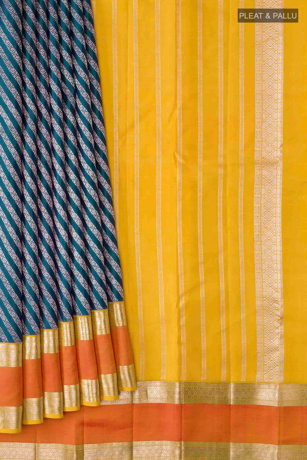 Pleats and pallu of Blue Kanchipuram Silk Saree with Zari Brocade on the body and Zari Border
