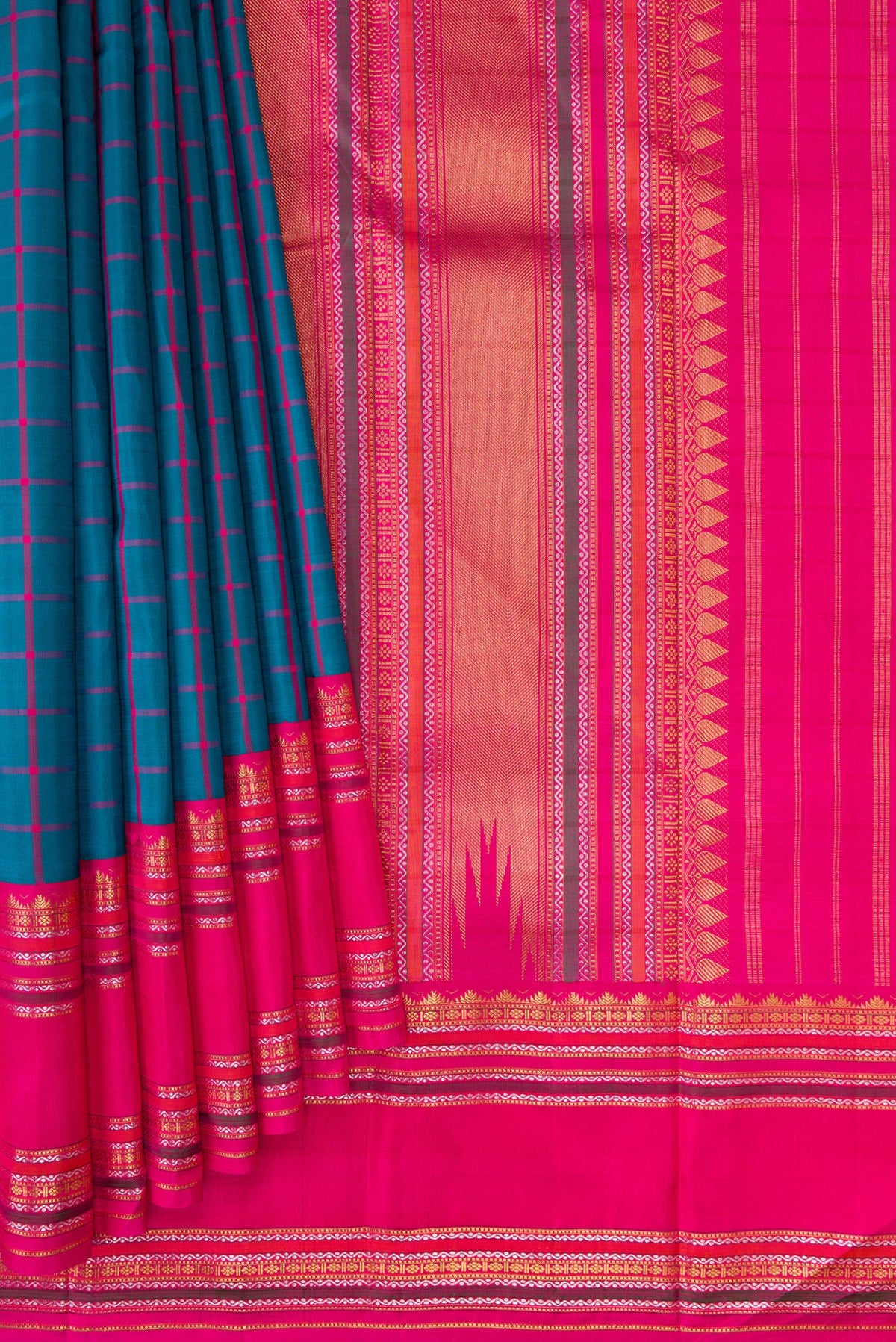 Pleats and pallu of Peacock Blue Dual Tone Kanjivaram Silk Saree with Checked design on the body and Zari Border. 