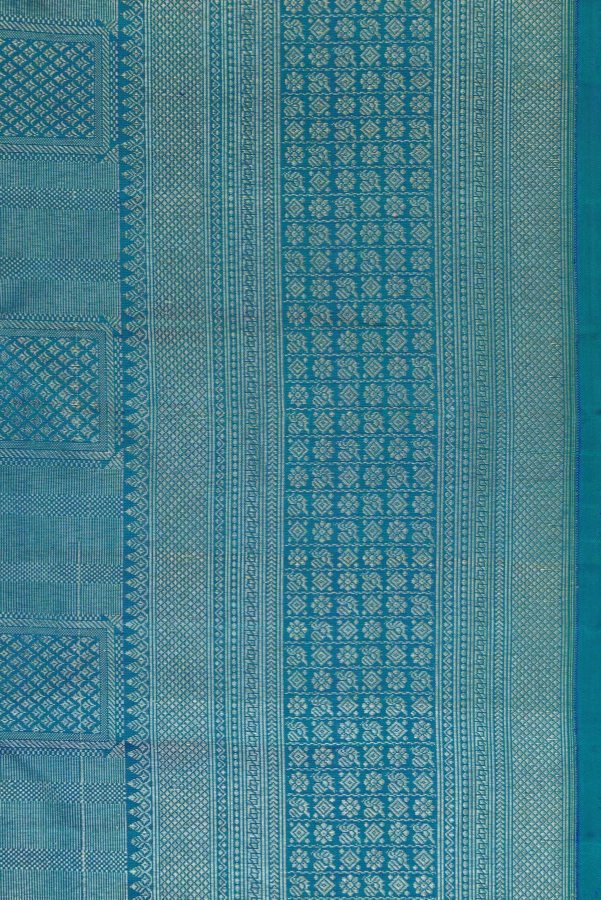 Border image of Peacock Blue Dual Tone Kanchipuram Silk Saree with Zari Brocade on the body and Zari Border. 