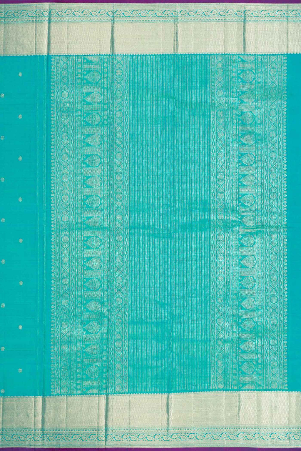 Close up image of the pallu of Blue Kanchipuram Silk Saree with Zari Butta on the body and Zari Border