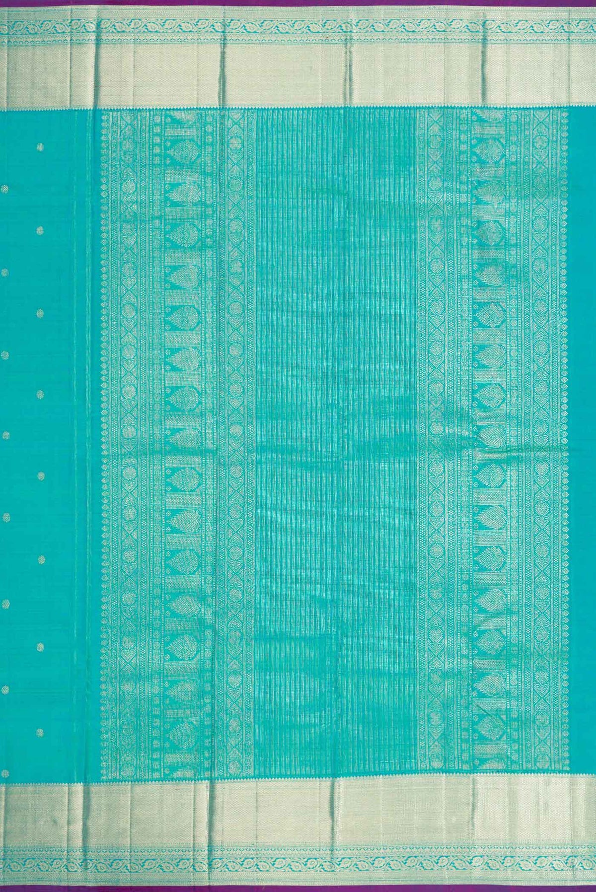 Close up image of the pallu of Blue Kanchipuram Silk Saree with Zari Butta on the body and Zari Border