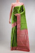 Mehandi Green Dual Tone Kanjivaram Silk Saree with Zari Brocade on the body and Zari Border.  displayed on a mannequin
