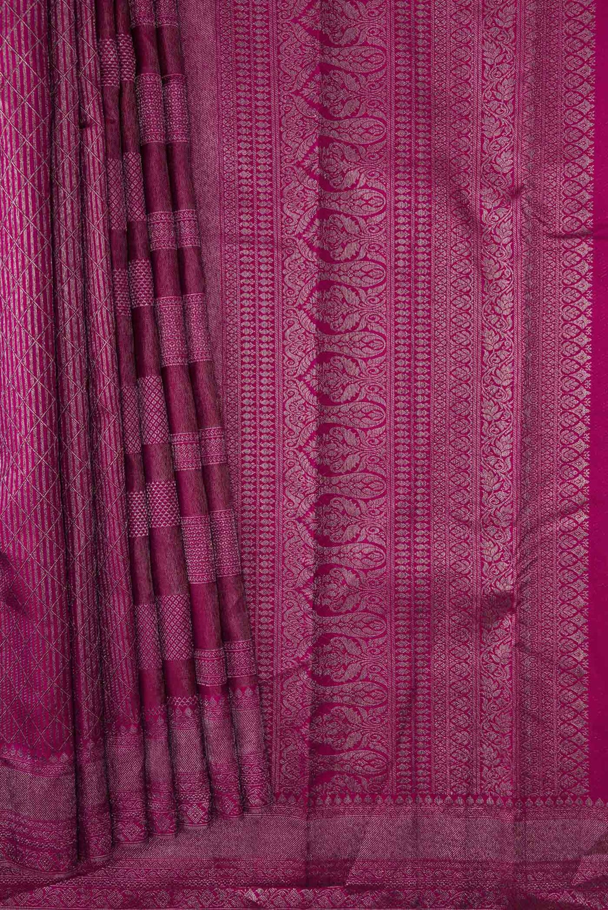Pleats and pallu of Magenta Dual Tone Kanchipuram Silk Saree with Zari Brocade on the body and Zari Border
