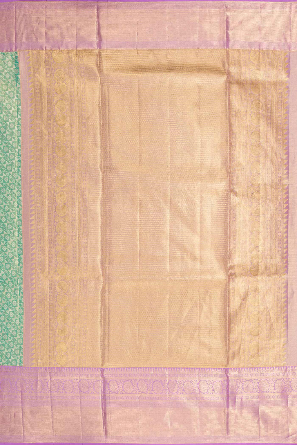 Close up image of the pallu of Green Dual Tone Kanchipuram Tissue Silk Saree with Zari Brocade on the body and Zari Border