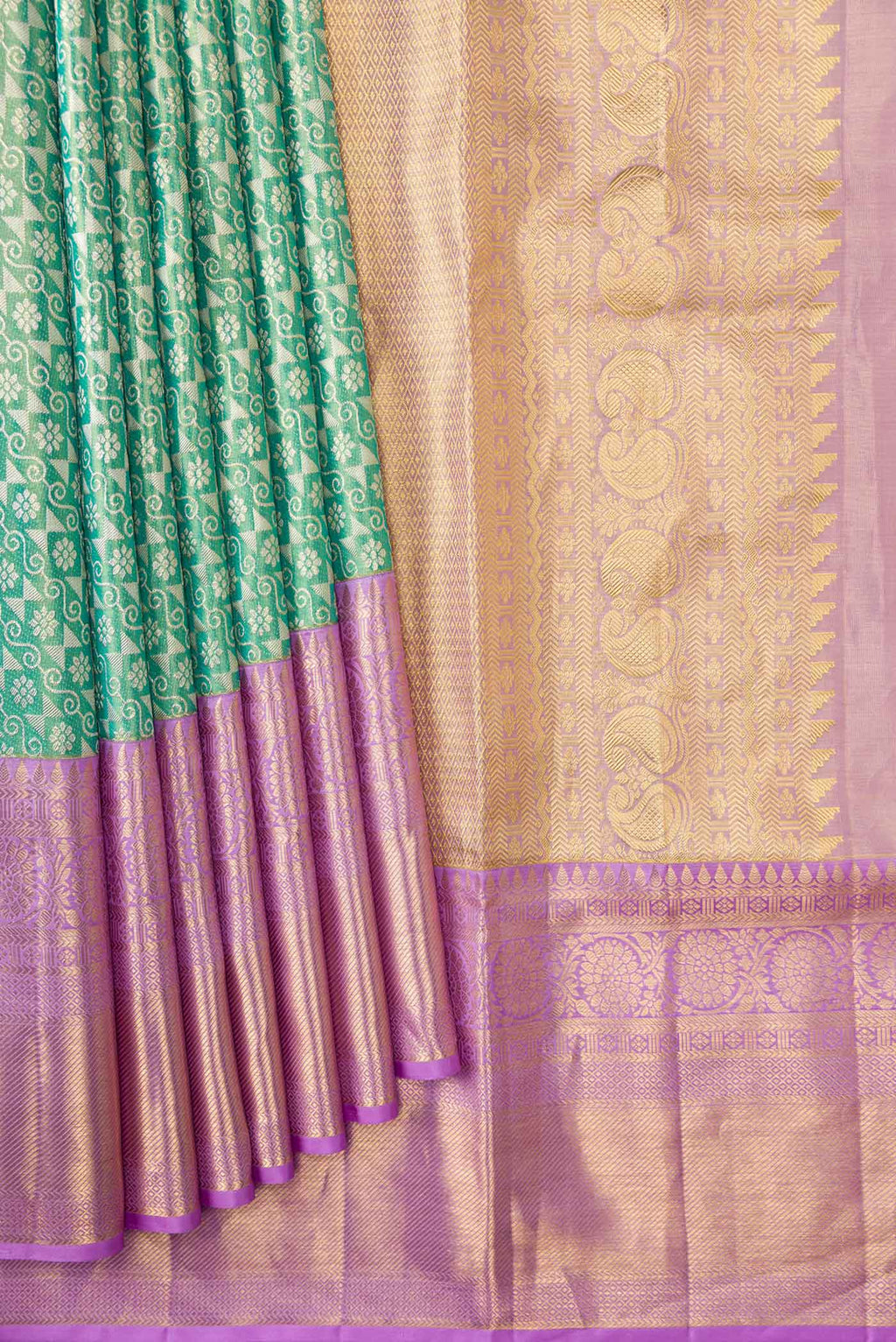 Pleats and pallu of Green Dual Tone Kanchipuram Tissue Silk Saree with Zari Brocade on the body and Zari Border
