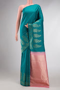 Peacock Blue Dual Tone Kanchipuram Silk Saree with Zari Butta on the body and Zari Border displayed on a mannequin