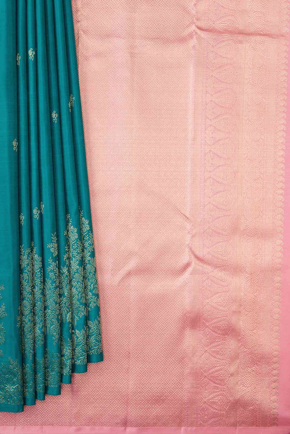 Pleats and pallu of Peacock Blue Dual Tone Kanchipuram Silk Saree with Zari Butta on the body and Zari Border