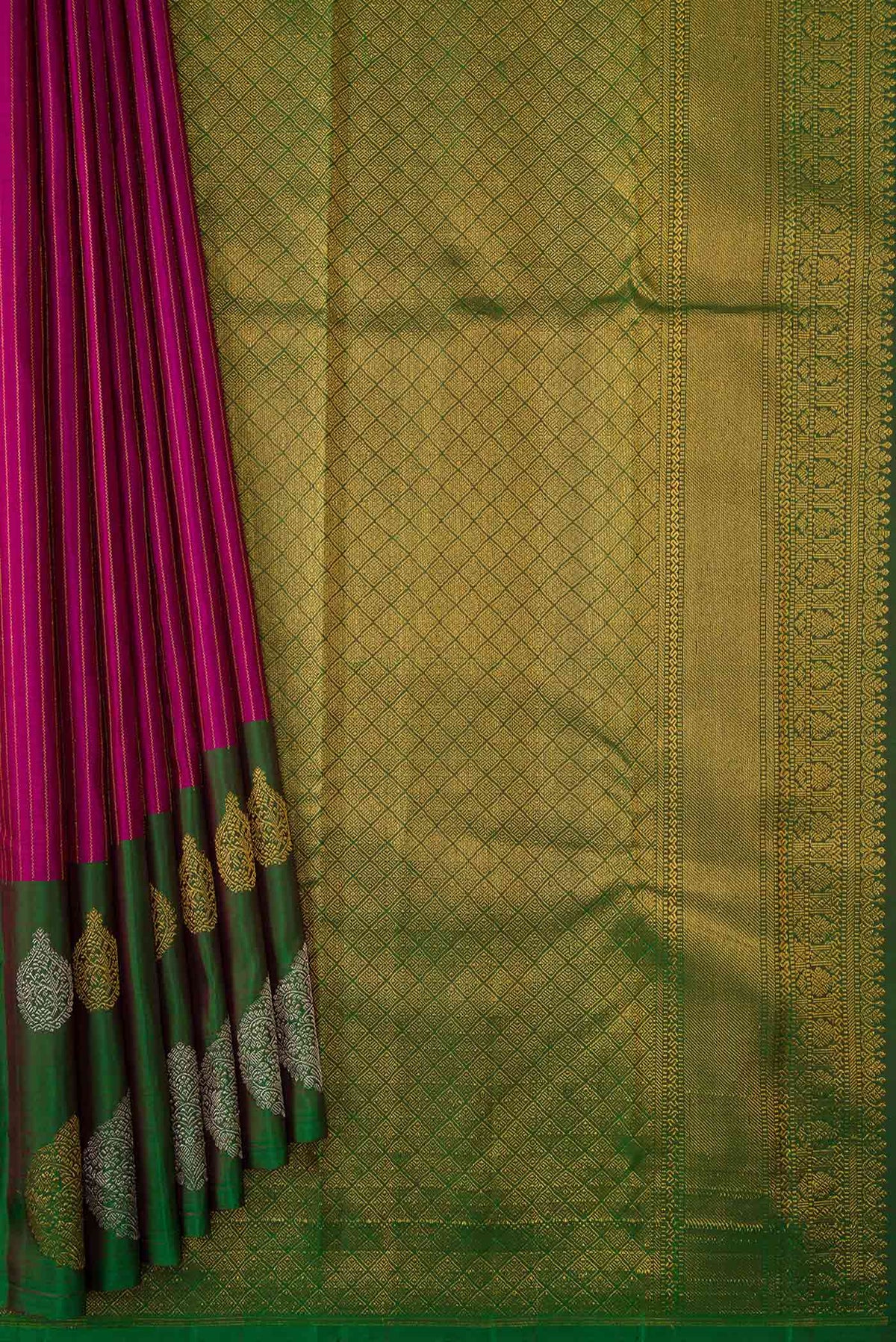 Pleats and pallu of Magenta Kanchipuram Silk Saree with Stripes on the body and One Side Border