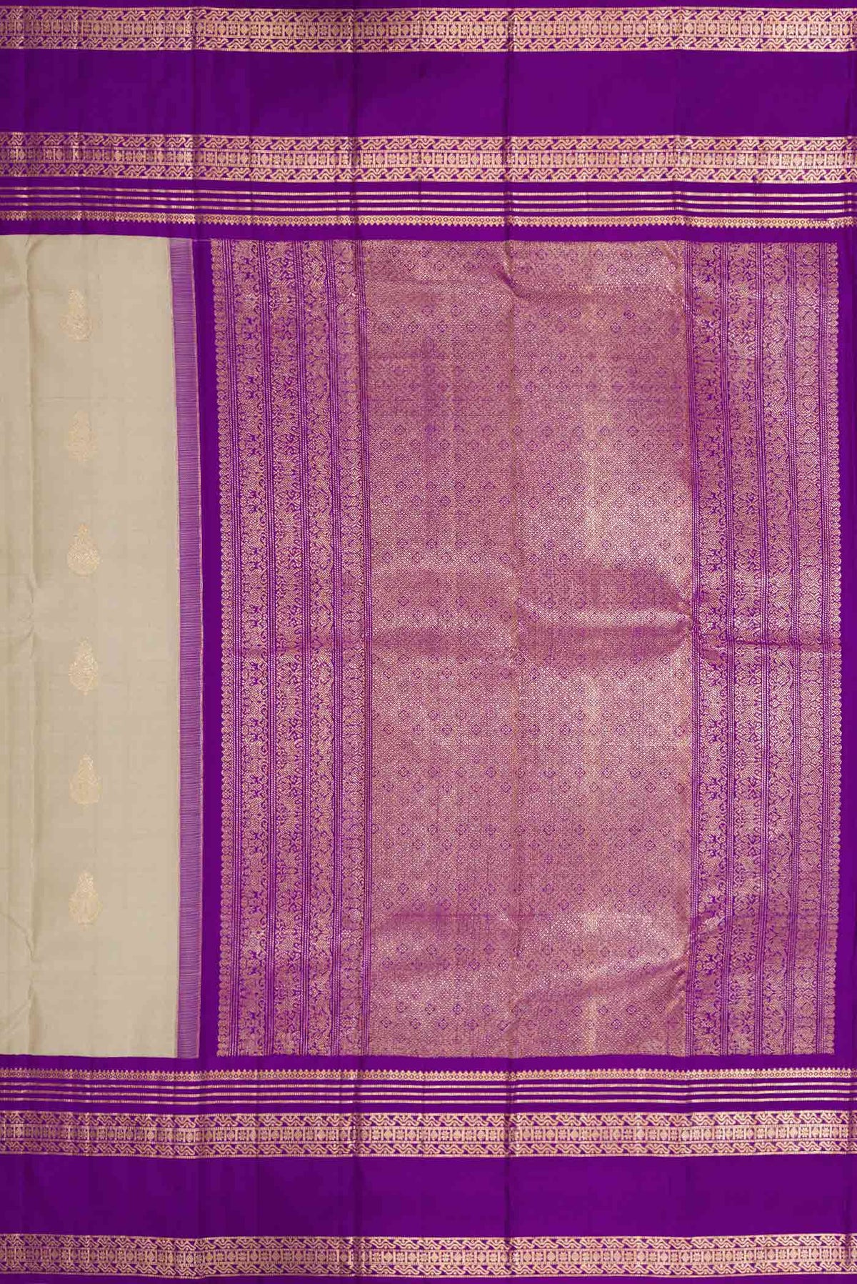 Close up image of the pallu of Grey Dual Tone Kanchipuram Silk Saree with Zari Butta on the body and Zari Border