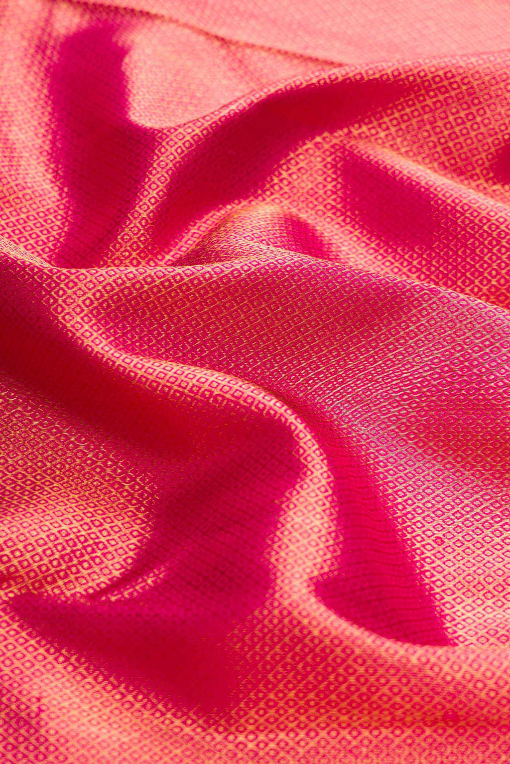 Close up of Pink Dual Tone Kanchipuram Silk Saree with Zari Brocade on the body and Zari Border displaying folds
