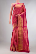 Pink Dual Tone Kanchipuram Silk Saree with Zari Brocade on the body and Zari Border displayed on a mannequin