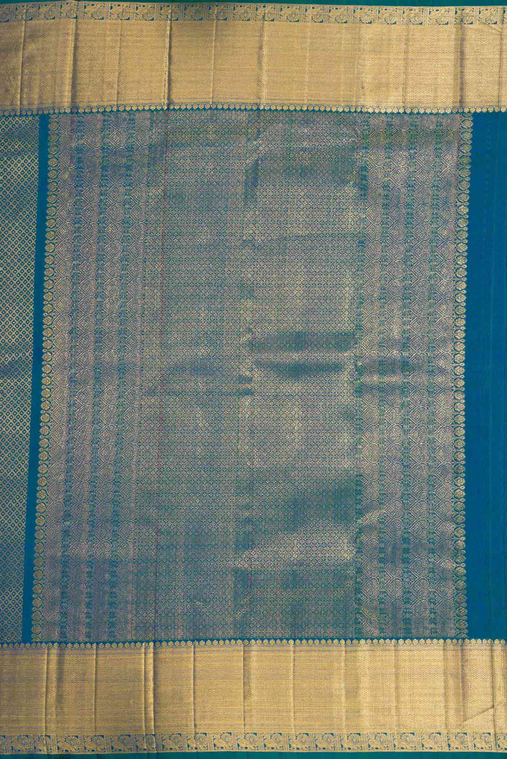 Close up image of the pallu of Peacock Blue Dual Tone Kanchipuram Silk Saree with Zari Brocade on the body and Zari Border