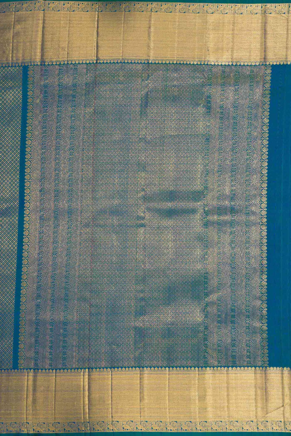 Close up image of the pallu of Peacock Blue Dual Tone Kanchipuram Silk Saree with Zari Brocade on the body and Zari Border
