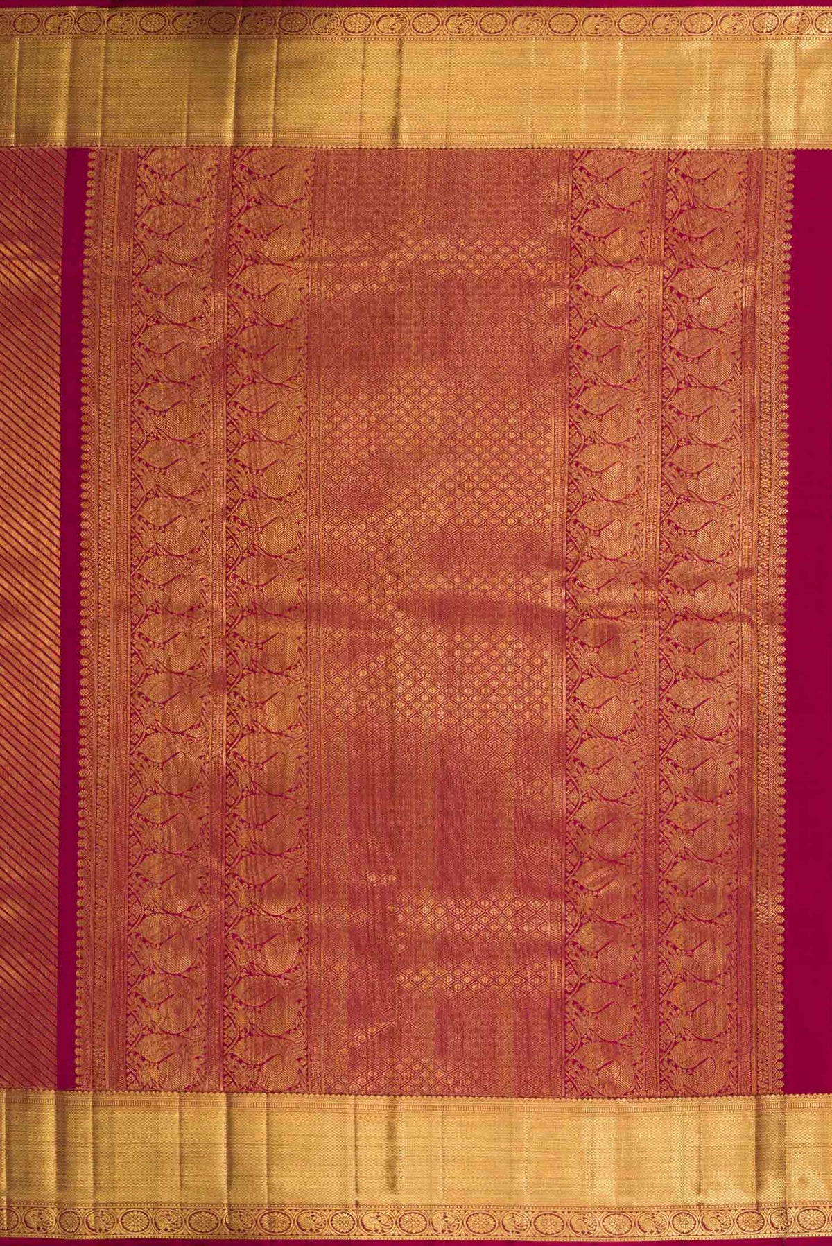 Close up image of the pallu of Maroon Dual Tone Kanchipuram Saree with Zari Brocade on the body and Zari Border