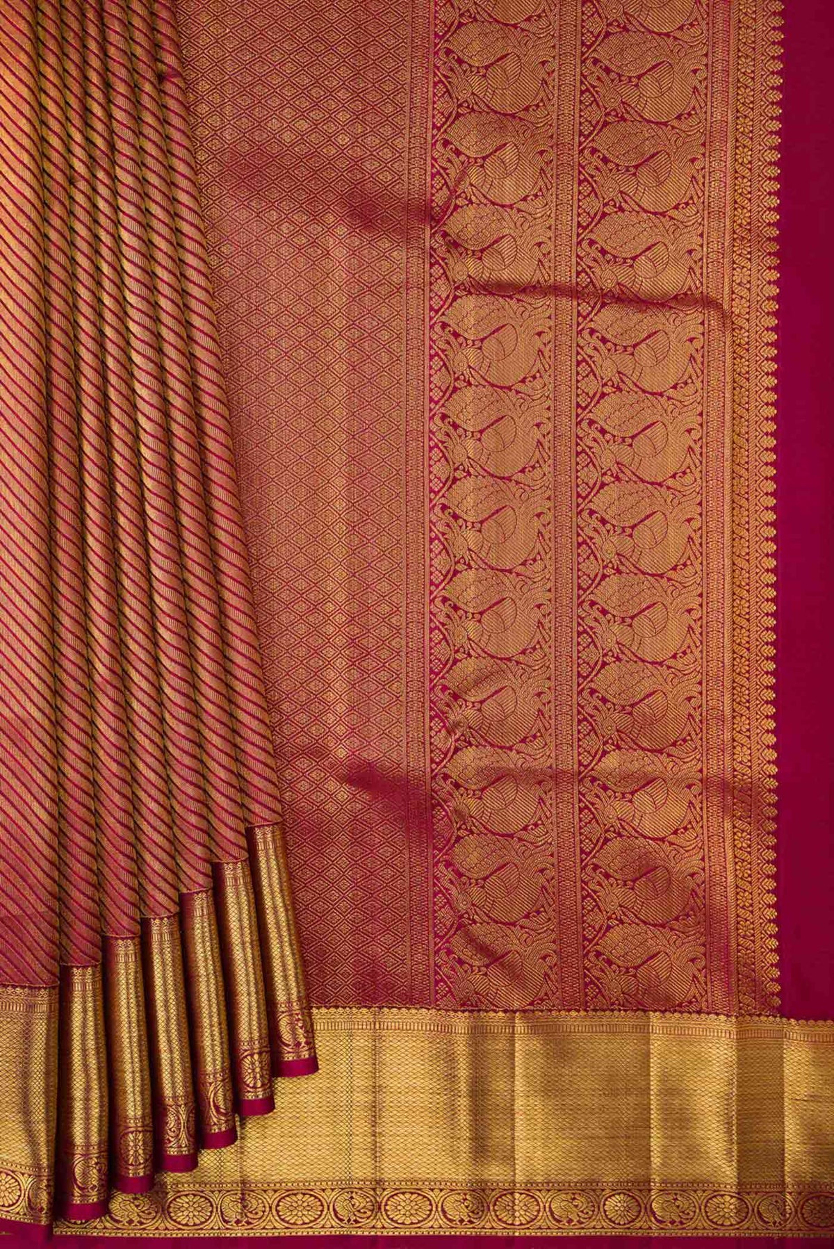Pleats and pallu of Maroon Dual Tone Kanchipuram Saree with Zari Brocade on the body and Zari Border