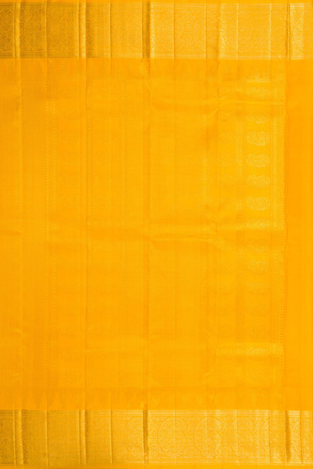 Close up image of the pallu of Mustard Dual Tone Kanchipuram Silk Saree with Zari Brocade on the body and Zari Border