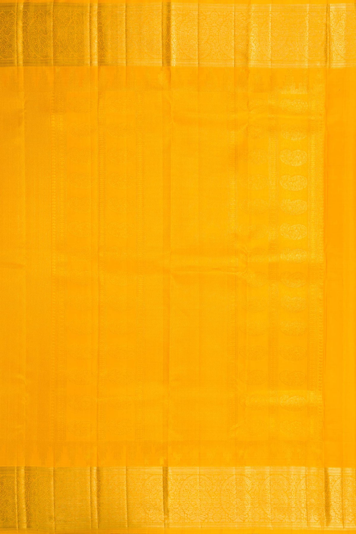 Close up image of the pallu of Mustard Dual Tone Kanchipuram Silk Saree with Zari Brocade on the body and Zari Border