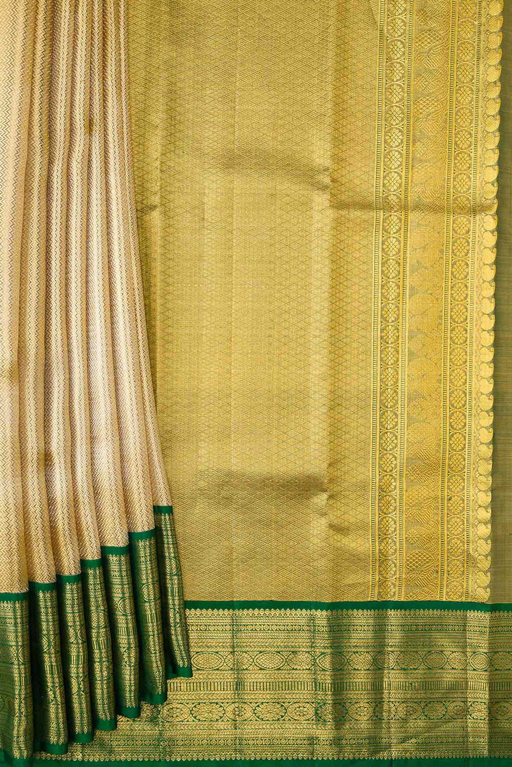 Pleats and pallu of Gold Dual Tone Kanchipuram Tissue Silk Saree with Zari Brocade on the body and Zari Border
