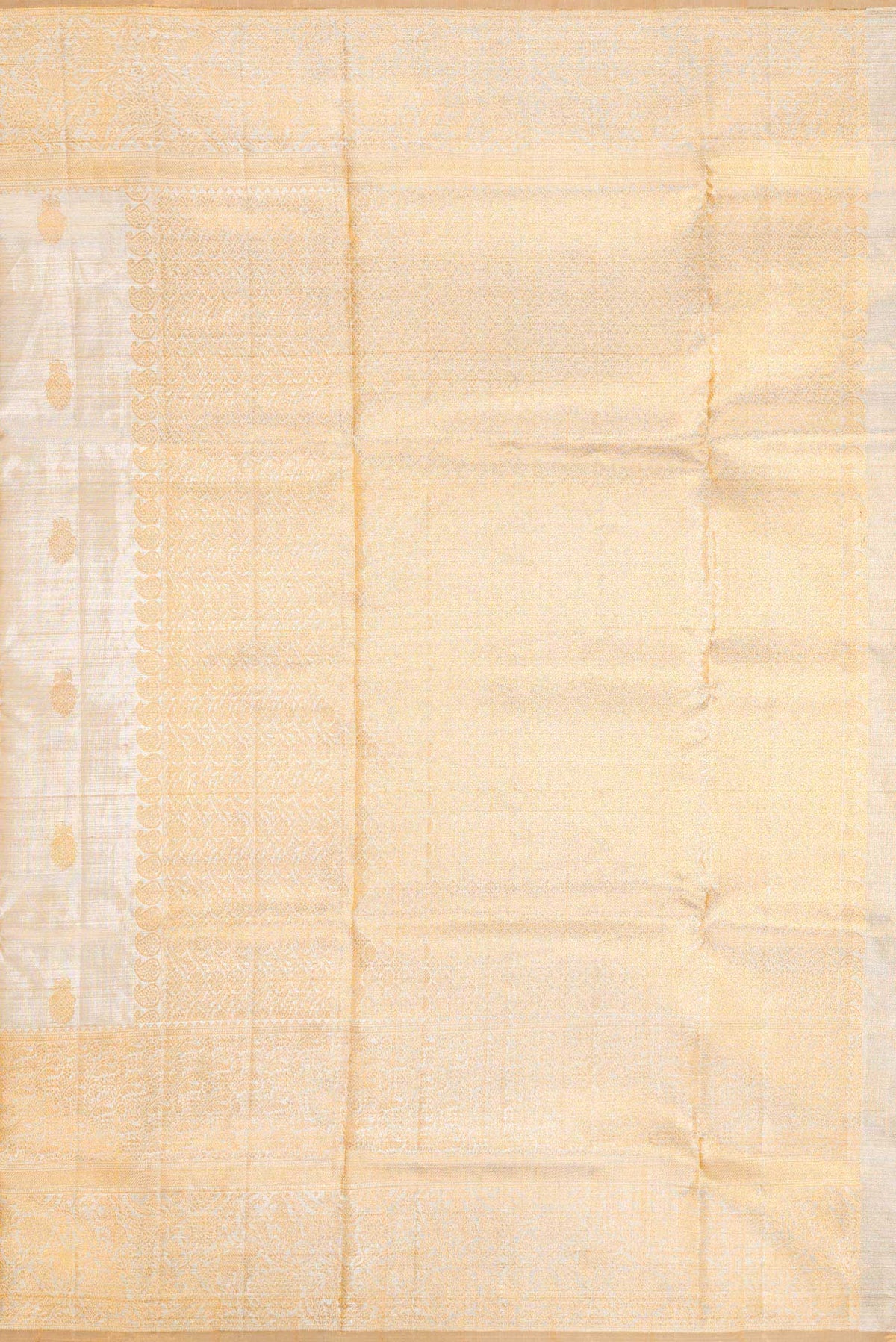 Close up image of the pallu of Sandal Dual Tone Kanchipuram Tissue Silk Saree with Zari Brocade on the body and Zari Border