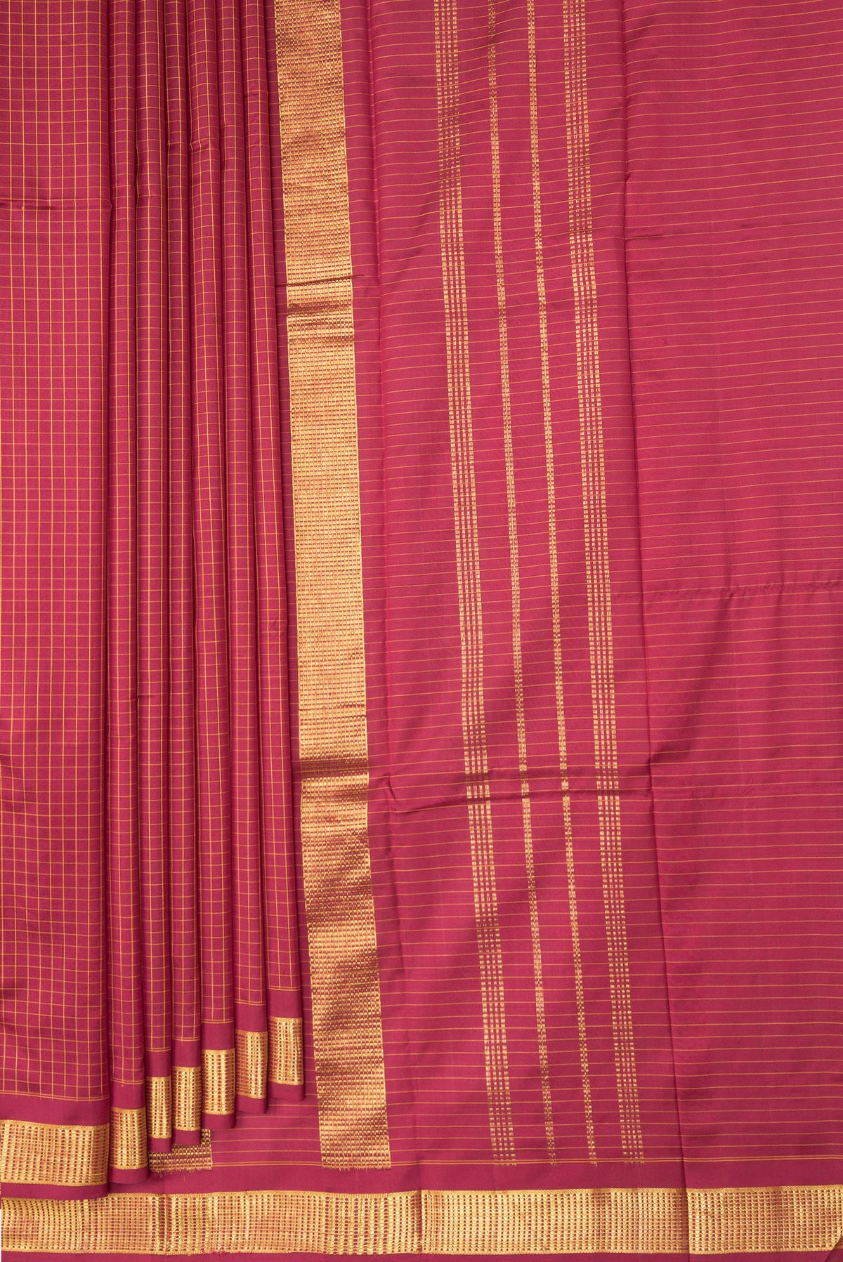 Pleats and pallu of Maroon Kanchipuram Silk Saree with Checked design on the body and Zari Border. 
