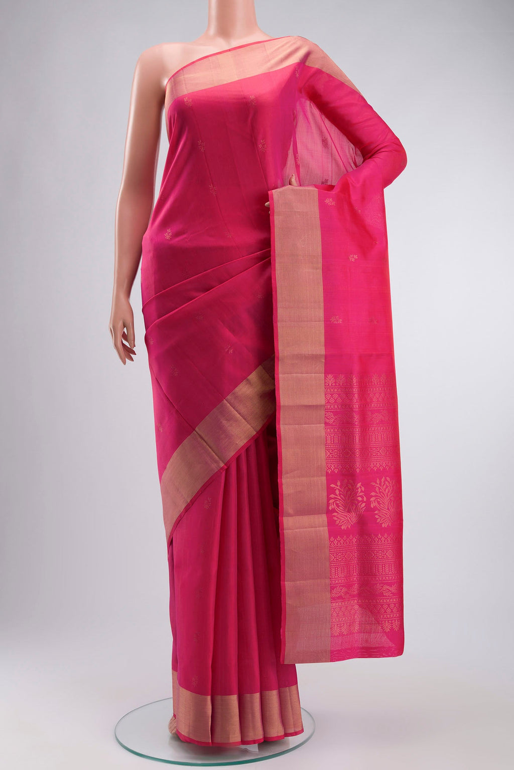 Pink Soft Silk Saree with Zari Butta on the body and Zari Border displayed on a mannequin