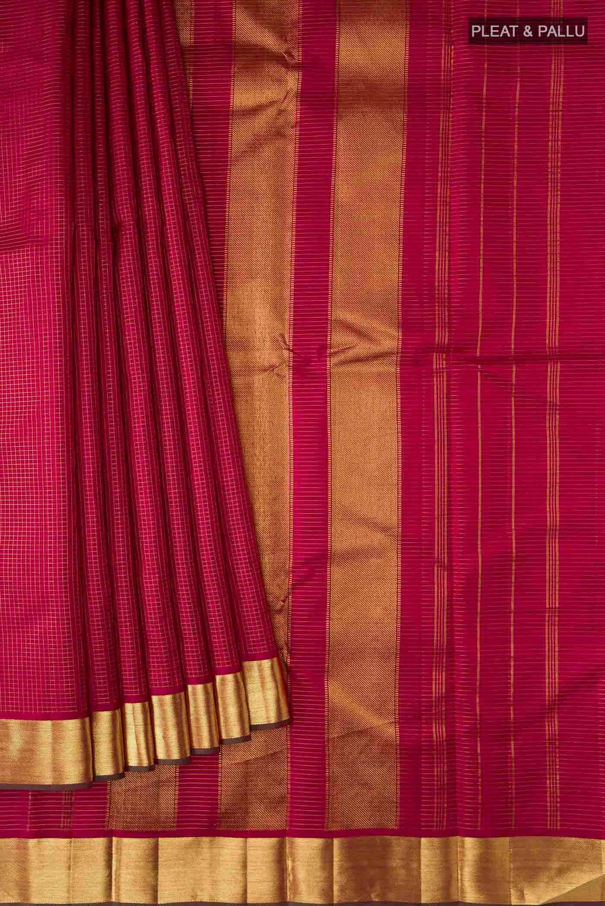 Pleats and pallu of Maroon Kanchipuram Silk Saree with Checked design on the body and Zari Border