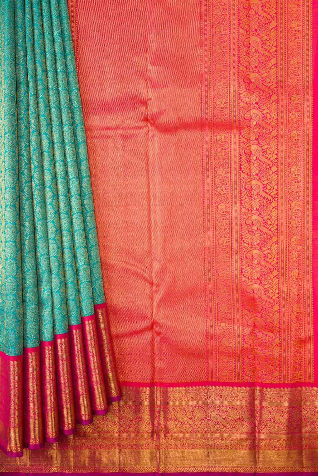 Pleats and pallu of Peacock Blue Dual Tone Kanchipuram Silk Saree with Zari Brocade on the body and Zari Border