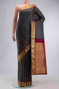 Blue Kanchipuram Silk Saree with Checked design on the body and Zari Border displayed on a mannequin