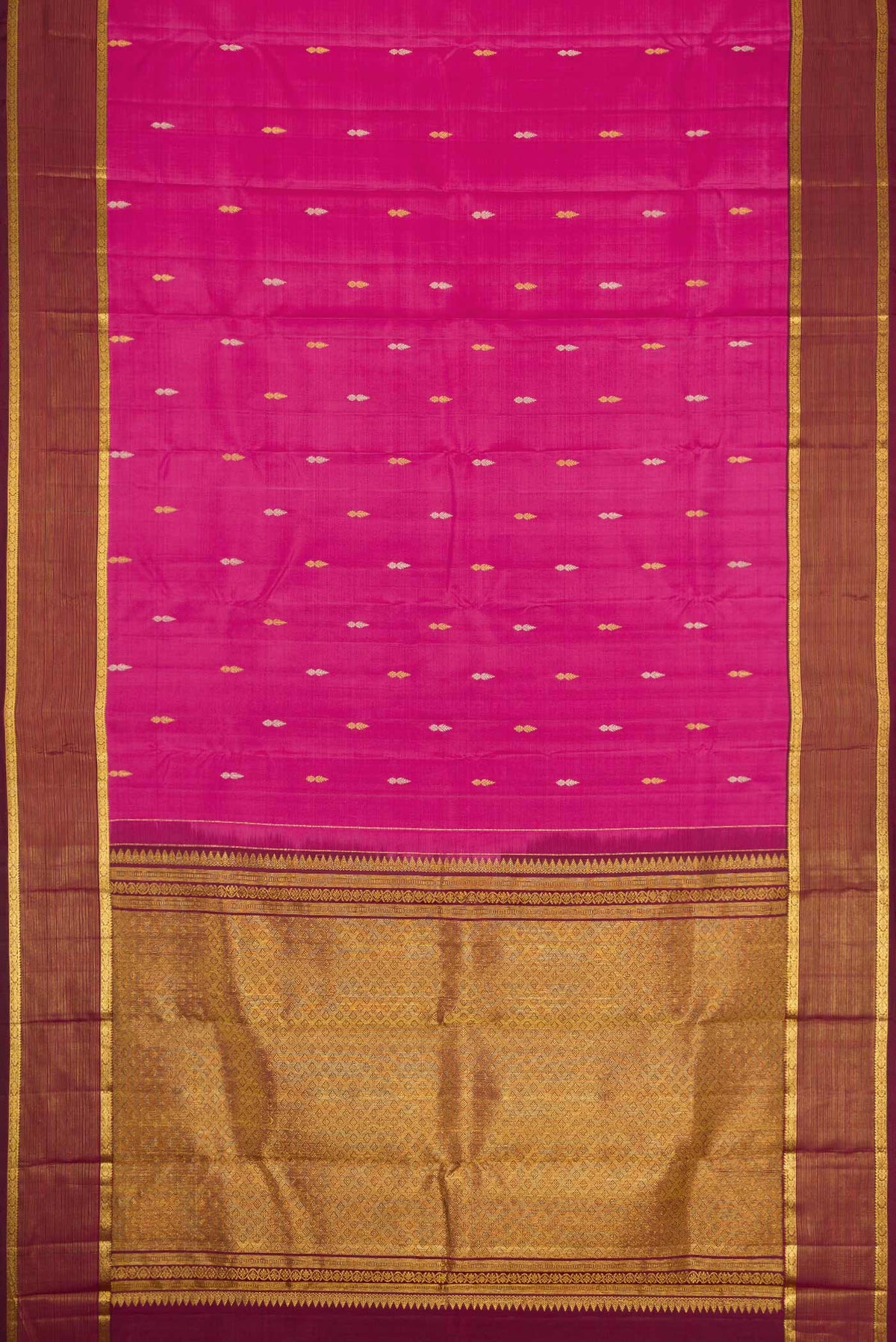 Flat view of Pink Dual Tone Kanchipuram Silk Saree with Zari Butta on the body and Zari Border