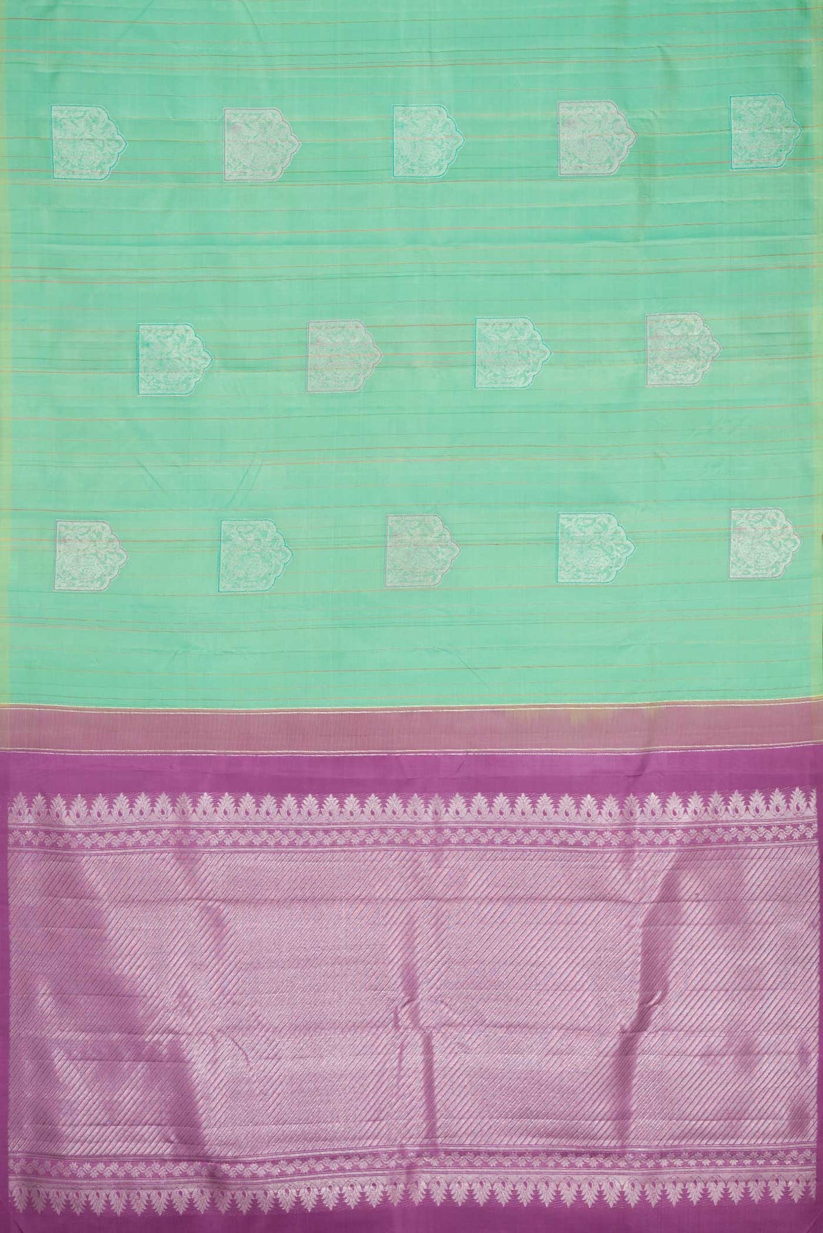 Flat view of Sea Green Dual Tone Kanchipuram Silk Saree with Zari Butta on the body and Without Border