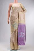 Beige Kanchipuram Silk Saree with Jacquard design on the body and Zari Border displayed on a mannequin