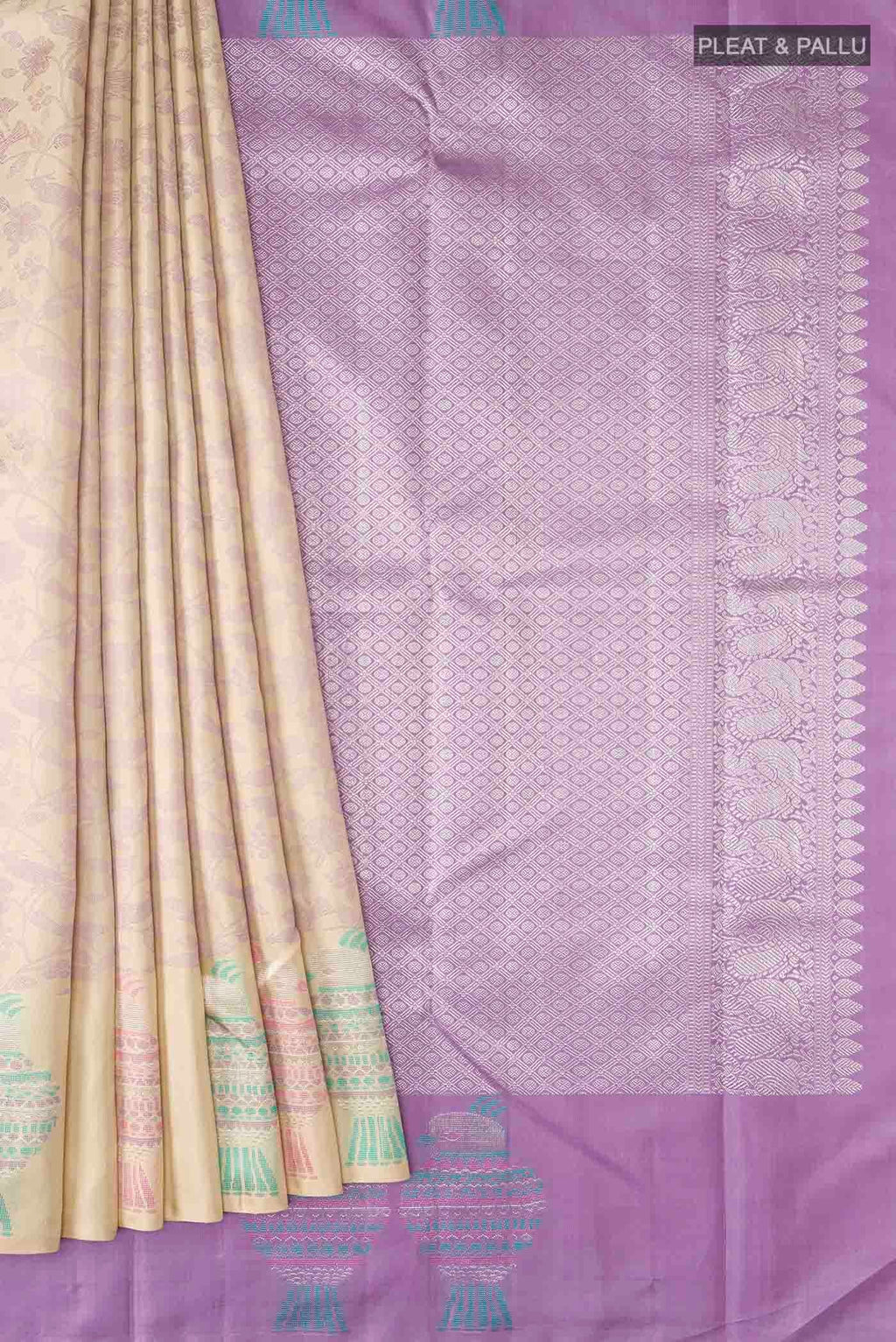 Pleats and pallu of Beige Kanchipuram Silk Saree with Jacquard design on the body and Zari Border