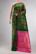 Bottle Green Dual Tone Kanchipuram Silk Saree with Zari Brocade on the body and Without Border displayed on a mannequin