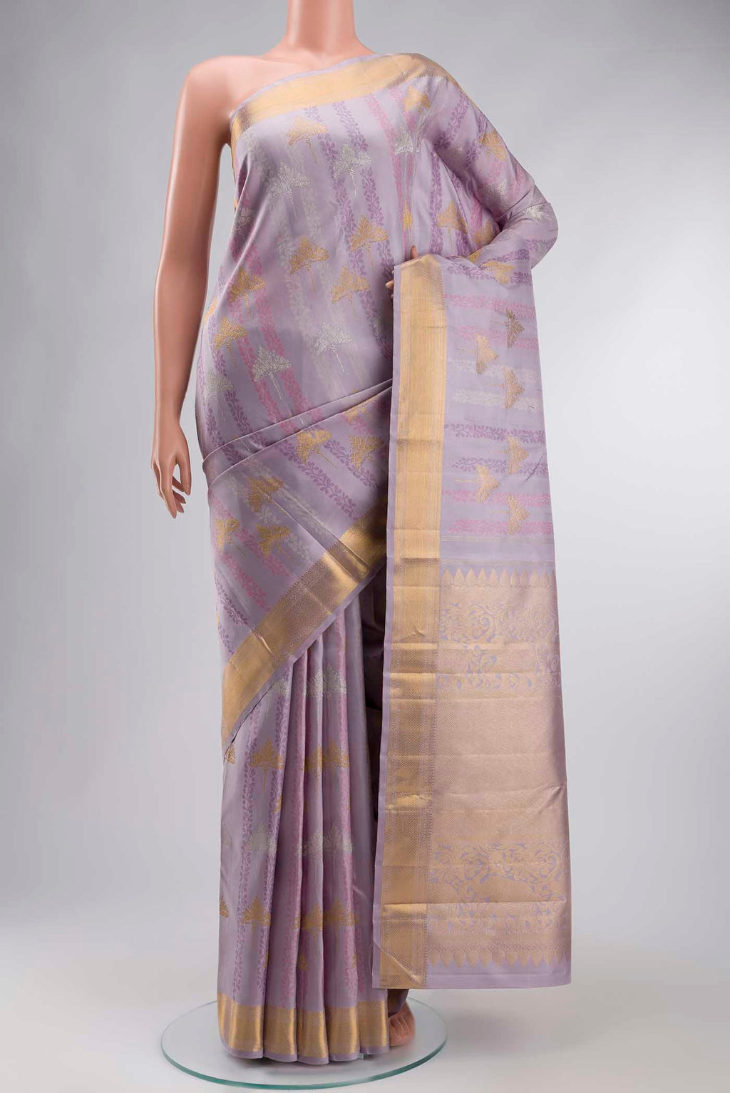 Lavender Kanchipuram Silk Saree with Jacquard With Zari Butta on the body and Zari Border displayed on a mannequin