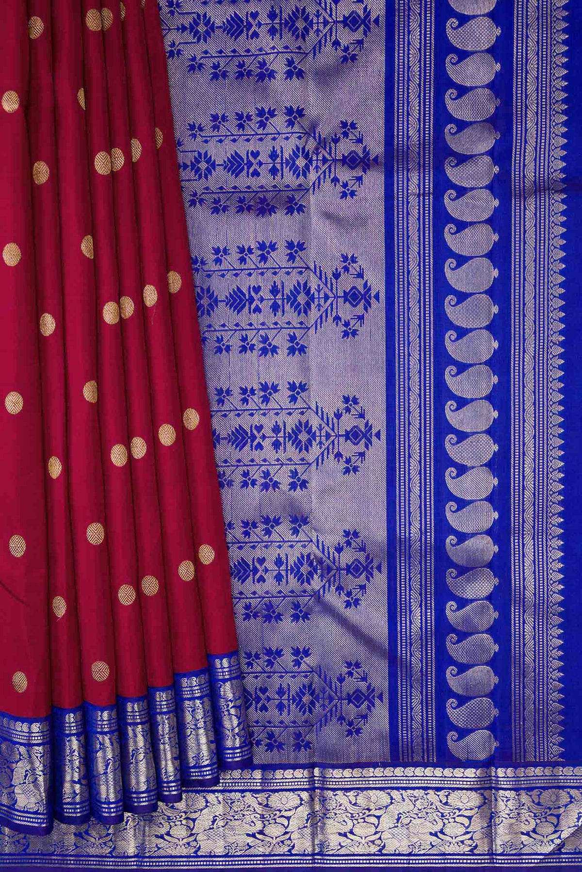 Pleats and pallu of Maroon Dual Tone Kanchipuram Silk Saree with Zari Butta on the body and Zari Border