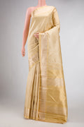 Sandal Dual Tone Kanjivaram Silk Saree with Jacquard With Zari Butta on the body and Zari Border.  displayed on a mannequin