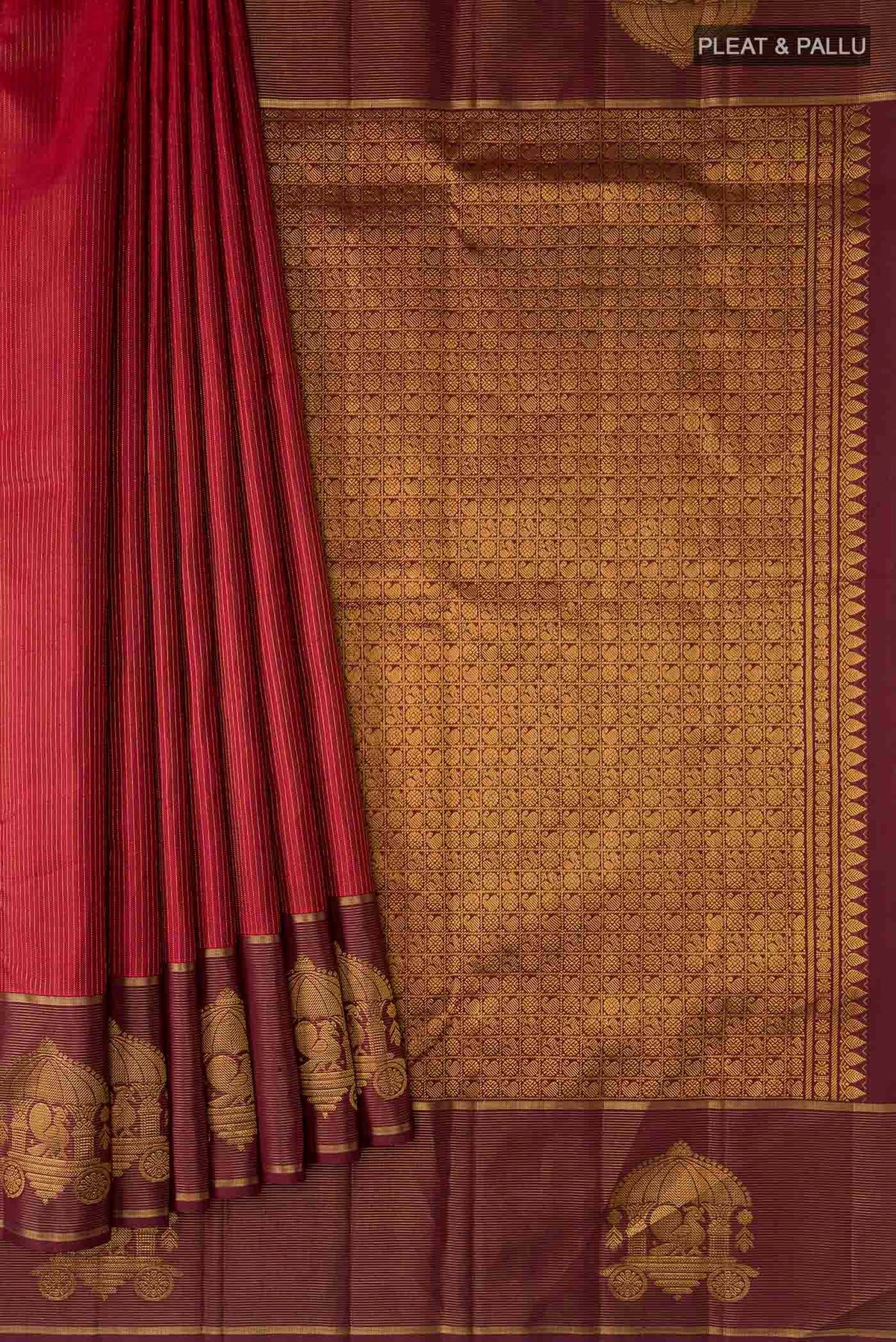 Pleats and pallu of Maroon Kanchipuram Silk Saree with Stripes on the body and Zari Border