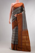 Grey Dual Tone Kanjivaram Silk Saree with Stripes on the body and Plain Border.  displayed on a mannequin
