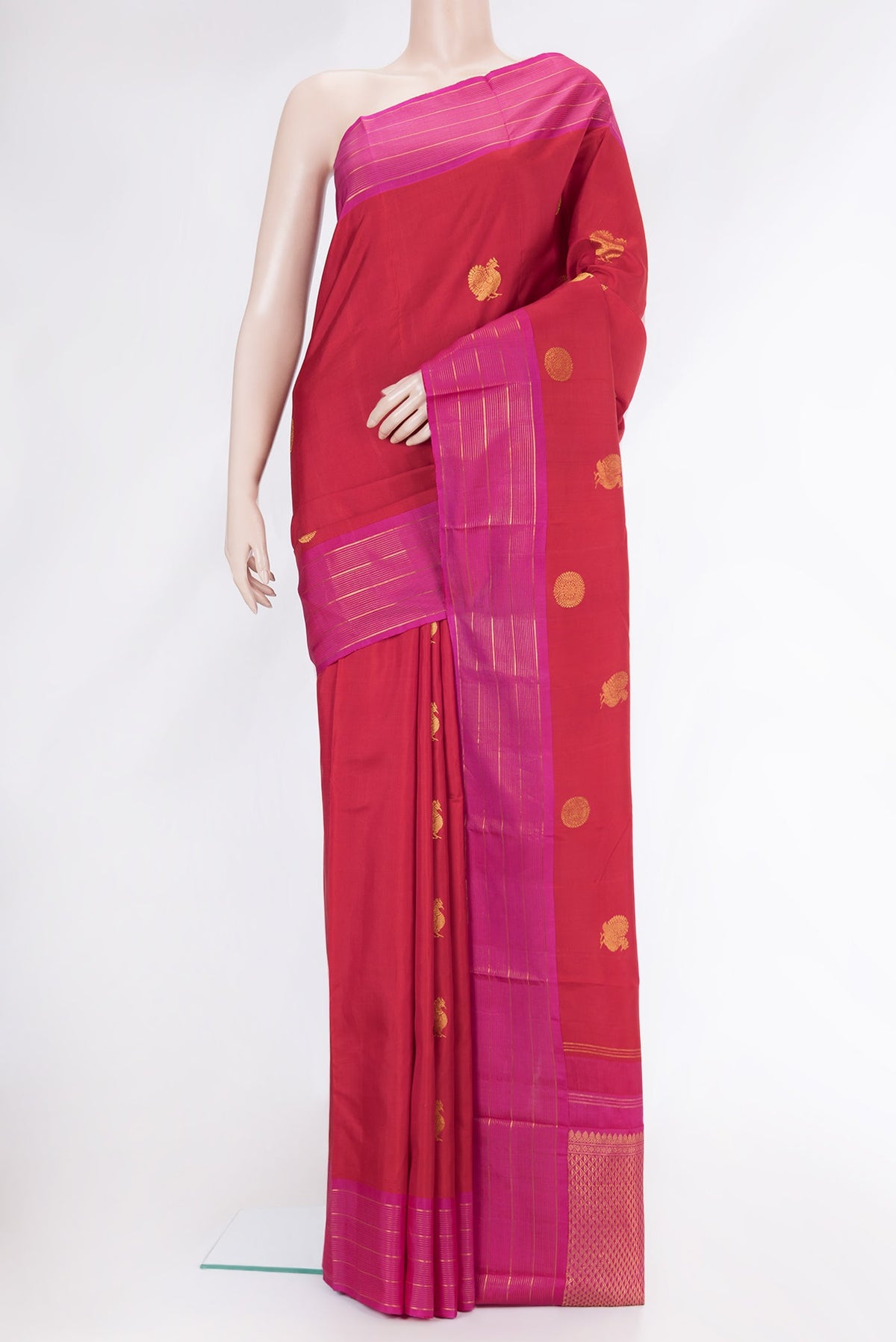Red Dual Tone Kanchipuram Silk Saree with Zari Butta on the body and Zari Border.  displayed on a mannequin