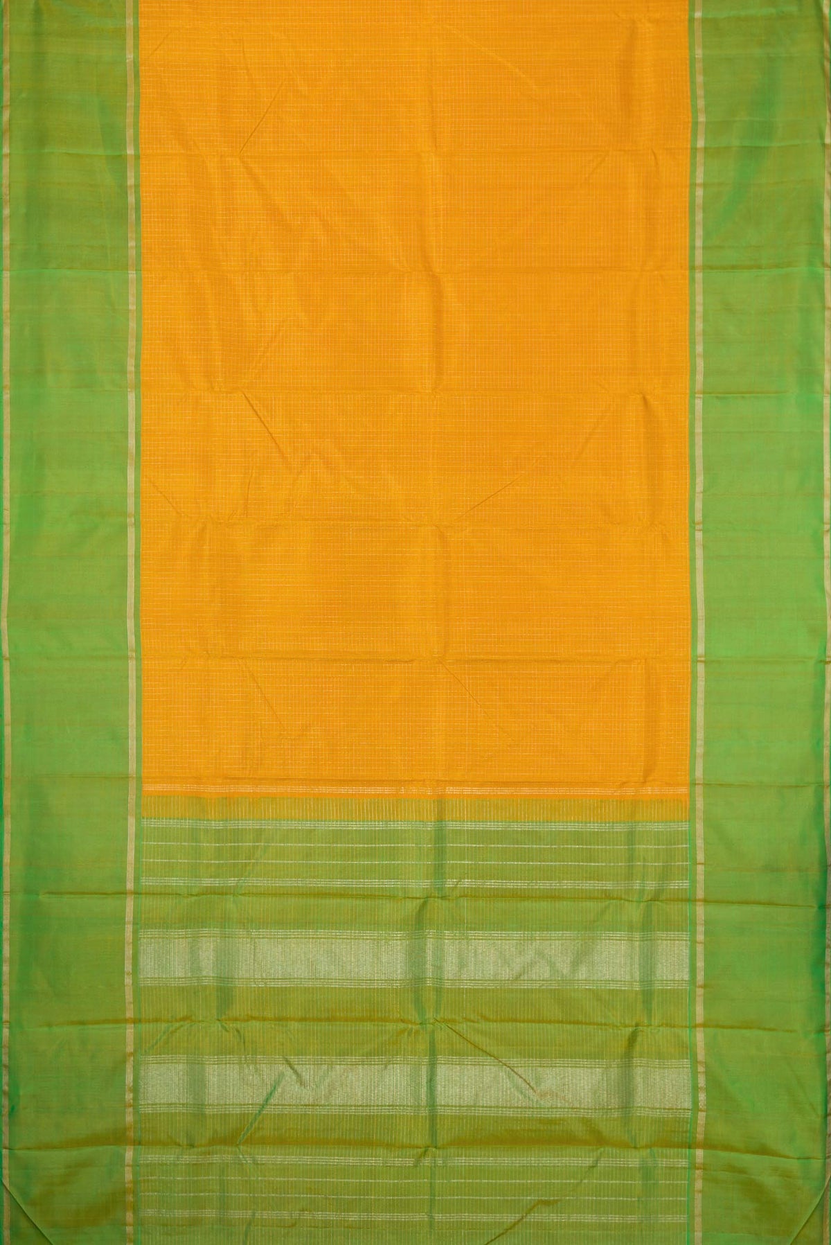 Flat view of Mustard Dual Tone Kanchipuram Silk Saree with Checked design on the body and Zari Border. 