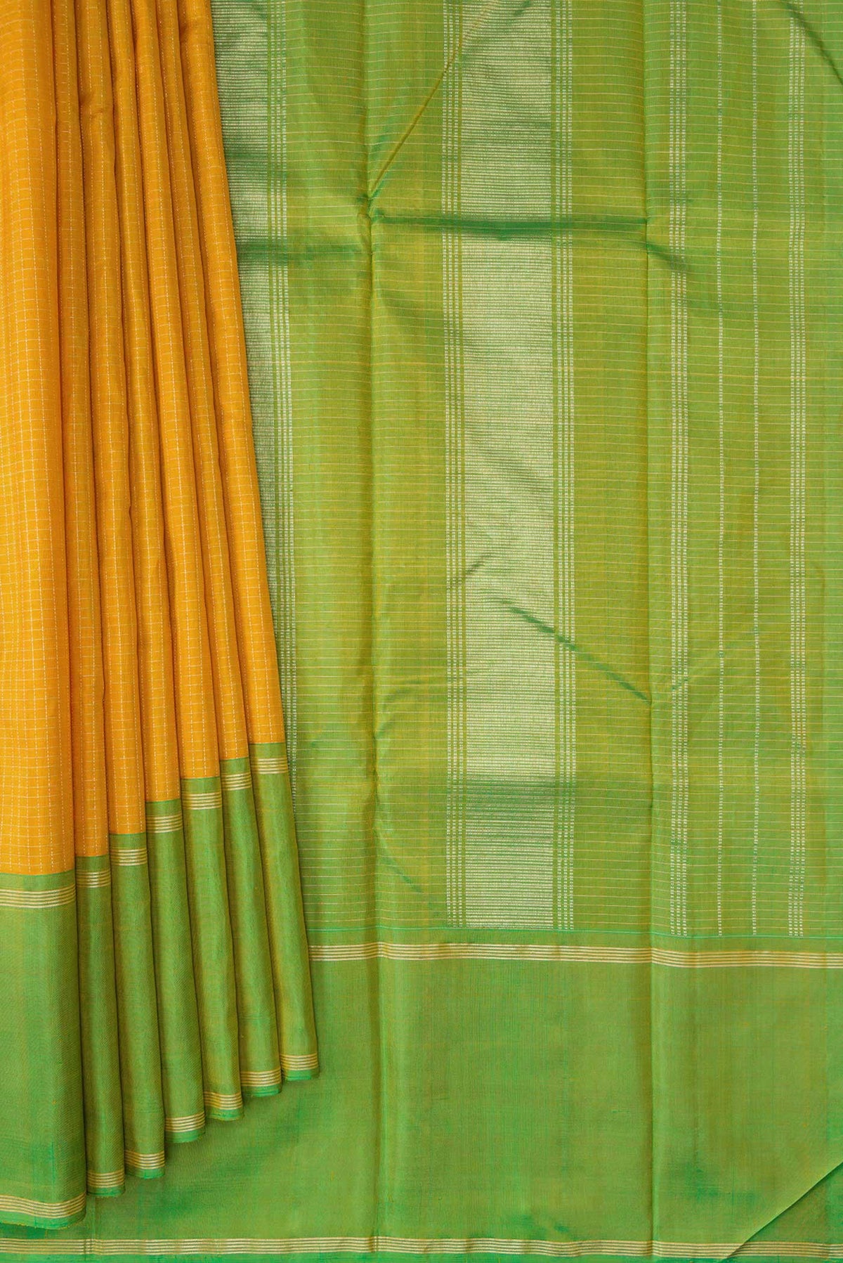 Pleats and pallu of Mustard Dual Tone Kanchipuram Silk Saree with Checked design on the body and Zari Border. 