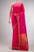 Pink Dual Tone Kanchipuram Silk Saree with Zari Butta on the body and Zari Border.  displayed on a mannequin